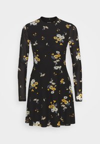 Vestido negro de flores con mangas largas de tul, que presenta flores amarillas y blancas y patrones geométricos. Cuerpo ajustado con falda acampanada.