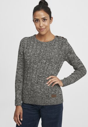 Gray knitted sweater with a ribbed texture. Features a scoop neckline, long sleeves, and two brown buttons on the shoulder. Leather logo patch.