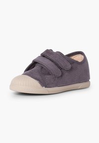 Purple corduroy shoe with two adjustable Velcro straps and a beige rubber toe cap. Textured upper and tonal stitching detail.