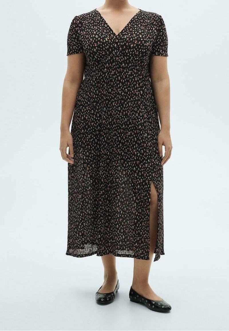 Schwarz geblümtes Kleid mit kurzen Ärmeln, V-Ausschnitt und seitlichem Schlitz. Hergestellt aus leichtem Material mit kleinen, bunten Blumenmustern.