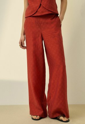 Next, REGULAR FIT - JACQUARD CHECKERBOARD WIDE LEG TROUSERS . - Trousers - rust red