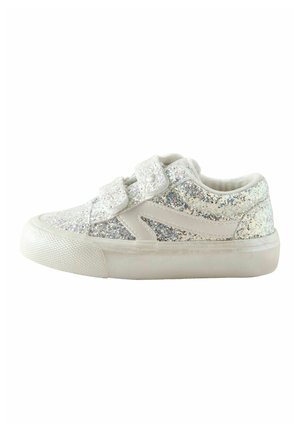 Child-sized sneaker with white glitter fabric, two Velcro straps, white sole, and light beige accents.