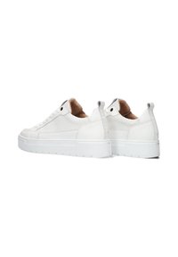 White sneakers made of textured leather with a smooth finish, round toe, lace-up design, and a chunky rubber sole.