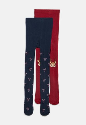 Deux paires de collants pour enfants, un bleu marine avec de petits nœuds roses et un rouge avec un visage de renne près de la cheville.