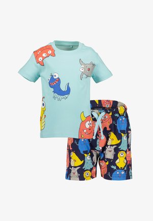 Kinder-Outfit bestehend aus einem hellblauen Baumwoll-T-Shirt mit bunten Monstergrafiken und dunkelblauen Shorts mit einem mehrfarbigen Monsterdruck.
