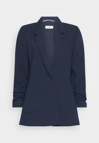 Marinblå kavaj av slät tyg, med notch-krage, enkel knappstängning och två framfickor med rynkad ärmdetalj.