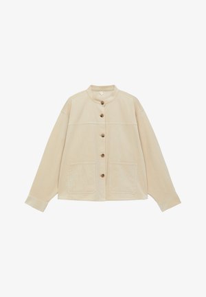 Beige Kordjacke mit runder Kragen, fünf Knöpfen an der Vorderseite, langen Ärmeln und zwei großen aufgesetzten Taschen vorne.