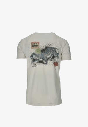 Biała bawełniana koszulka z krótkim rękawem, z okrągłym dekoltem, z grafiką kota, znaczkami i tekstem.