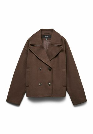 Pruun topeltreaga karvane mantel laia kraega, üle mõõtmete ja küljetaskutega. Valmistatud pehmest, tekstuurse kangastusega materjalist, millel on nööbiga kaunistused.