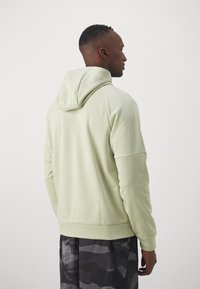 Nike Performance Mikina s kapucňou - olive aura/black