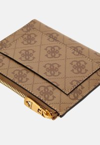 Brown patterned wallet with a textured finish, featuring a zip closure and gold-tone hardware, and two card slots on the front.