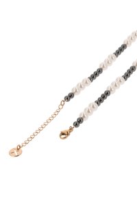 Perlekæde med skiftende hvide og sorte perler, med en guldfarvet lynlås og justerbar kædedetalje.