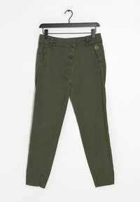 Olivgröna byxor med smal passform, femknappsknäppning och två sidan fickor. Tillverkade av mjukt tyg med en slät yta och sydd fåll.