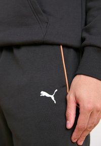 Puma Teplákové kalhoty - puma black
