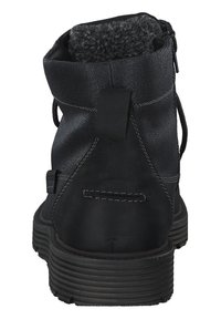 Sort ankelstøvle med tekstureret overdel, grå fleece foring og kontrasterende syninger. Har en trækstrop og rund gummisål.