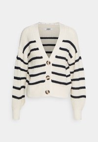 Krämfärgad stickad cardigan med svarta horisontella ränder, djup V-ringning, tre stora runda knappar samt ribbade ärmslut och fåll.