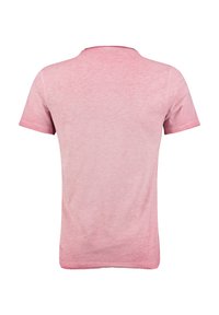 Korte mouw t-shirt in lichtroze, gemaakt van zachte stof. Heeft een ronde halslijn en een gladde, lichtjes gestructureerde oppervlakte.
