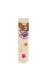 Calzino beige con un cane dei cartoni animati con accenti marroni e rosa. Impronte decorative in rosa, giallo e arancione nella sezione inferiore.