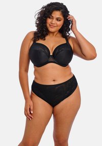 Black lingerie set featuring a padded bra with lace accents and high-waisted panties, both made from smooth fabric.