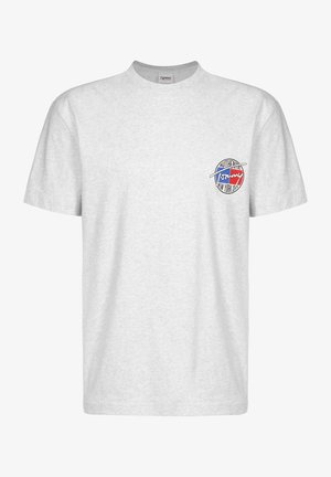 Gray cotton T-shirt with a round neck, short sleeves, and a circular logo featuring red, white, and blue colors on the left chest.