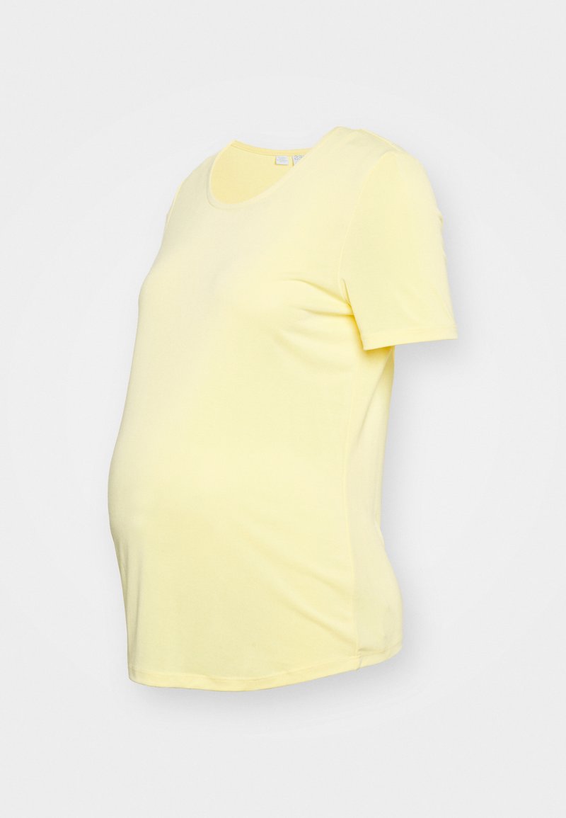 T-shirt de maternidade em tecido amarelo suave, com mangas curtas, decote redondo, corte ajustado, projetado para acomodar uma barriga em crescimento.