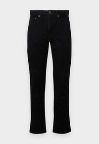 Jeans de ganga preta com um design de perna reta, fecho de botão, cinco bolsos e rebites de cobre subtis na frente. Textura suave.