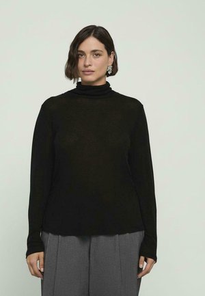 - Bluzka z długim rękawem