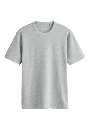 Helehall helelühikeste varrukatega ümmarguse kaelusega T-särk, millel on peen sooniline tekstuur, eksponeeritud lamedalt valgel taustal.