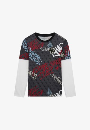 Cămașă cu mânecă lungă, fabricată dintr-un material negru cu un model, decorată cu texte și accente de logo în stil graffiti colorat. Mâneci albe pentru un contrast plăcut.