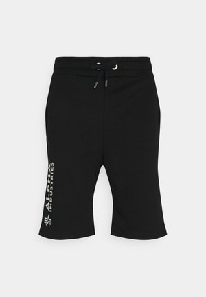Schwarze Shorts aus weichem Stoff mit elastischem Bund und Kordelzug. Mit einem weißen Logo auf der Seite.
