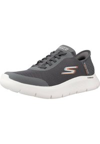 Gray synthetic athletic shoe with a mesh upper, white cushioned sole, and gray laces. Features a logo on the side and textured detailing.