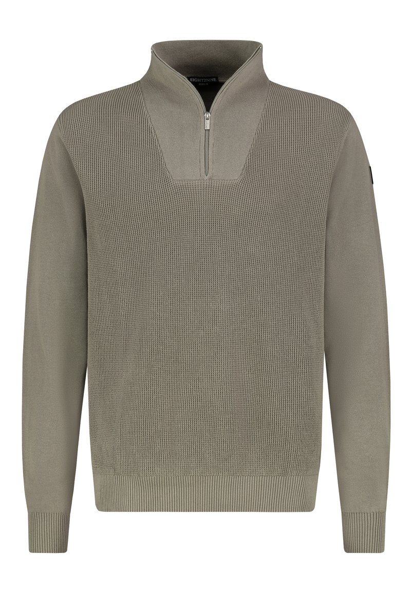 Knit pullover in light olive green, features a half-zip collar, textured pattern, ribbed cuffs, and hem. No visible logo or accents.