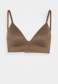 Brown wireless bra with thin adjustable straps, smooth texture, and a deep V-neck design. Minimalist style with no visible hardware.