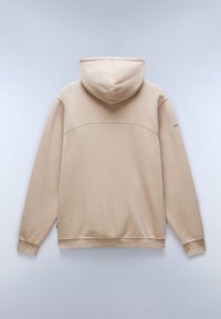 Sudadera con capucha beige de textura suave, que presenta una costura curva en la parte posterior y puños acanalados. Diseño minimalista, sin patrones adicionales.