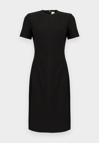 Μαύρο εφαρμοστό φόρεμα έως το γόνατο με κοντά μανίκια, στρογγυλή λαιμόκοψη, ραφές ως λεπτομέρεια και φερμουάρ στο πίσω μέρος.