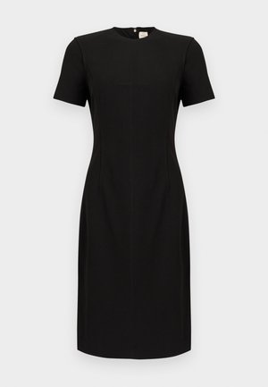 Μαύρο εφαρμοστό φόρεμα έως το γόνατο με κοντά μανίκια, στρογγυλή λαιμόκοψη, ραφές ως λεπτομέρεια και φερμουάρ στο πίσω μέρος.