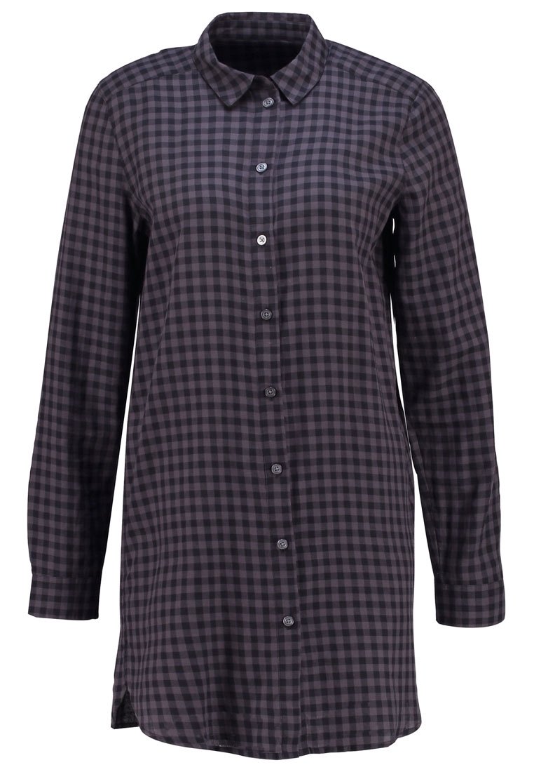 Chemise à manches longues avec boutons, motif à carreaux noir et gris foncé, col pointu.