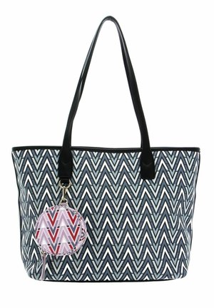 Grand sac fourre-tout avec un motif en chevrons noir, blanc et gris. Dispose de poignées noires et d'une pochette ronde détachable avec un design géométrique.