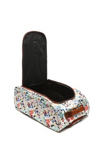 Floral-patterned travel bag with a light blue fabric exterior, chocolate brown accents, and a black interior. Zip closure and side handle.