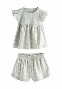 Světlý zelený, bavlněný dvoudílný outfit s topem s volnými rukávy a květinovým potiskem a dekorativním lemem, doplněný o šortky na elastický pás.