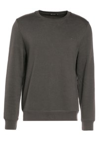 Sudadera gris oscuro hecha de tejido suave, con cuello redondo, mangas largas, puños acanalados y un sutil logo en el pecho.
