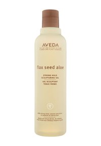 Aveda Flax Seed Aloe sculpting gel in een slanke, transparante fles. Lichtgele vloeistof, bruin deksel, met minimalistische bruine labeltekst.
