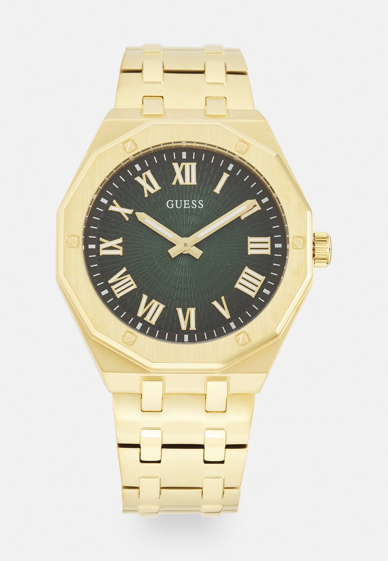 Gouden octagonale horloge met een groen patroon op de wijzerplaat, Romeinse cijfers als markeringen, en een schakelarmband van roestvrij staal.