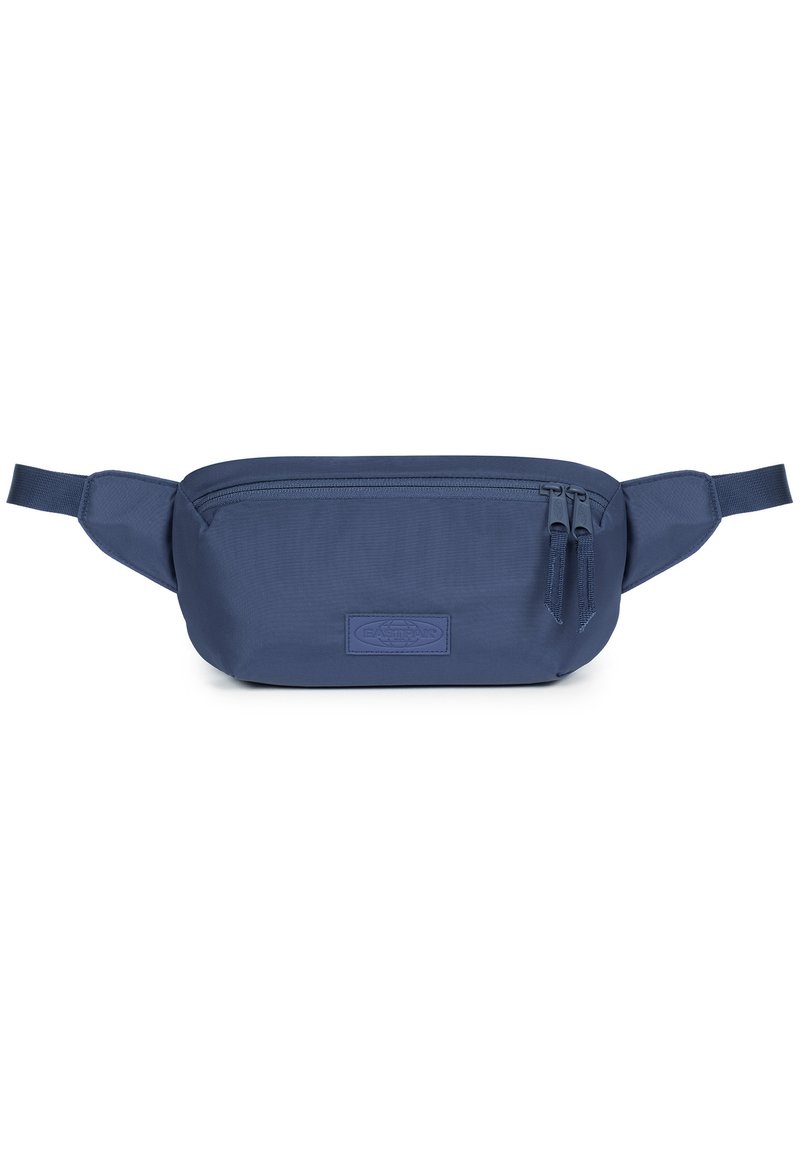 Borsetta in navy blue realizzata in tessuto resistente, dotata di un compartimento principale con cerniera e due cerniere laterali, con una patch del logo sulla parte anteriore.