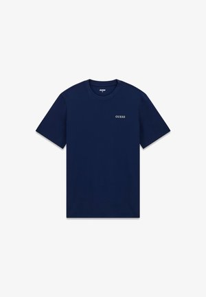 Marineblauw katoenen T-shirt met korte mouwen en een ronde hals. Voorzien van een klein wit "GUESS" logo op de linkerborst. Soepele textuur.