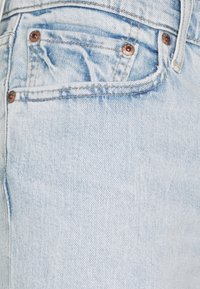 Levi's® SKINNY TAPER - Calças de ganga de corte skinny - light indigo - worn in