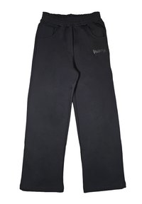 Pantaloni tuta neri in morbido tessuto, dotati di un elastico in vita, due tasche laterali e un piccolo logo sulla parte anteriore.