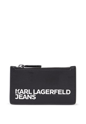 Portafoglio in pelle nera con chiusura a zip, caratterizzato da un evidente brand bianco "KARL LAGERFELD JEANS" sul fronte. Texture liscia, forma rettangolare.