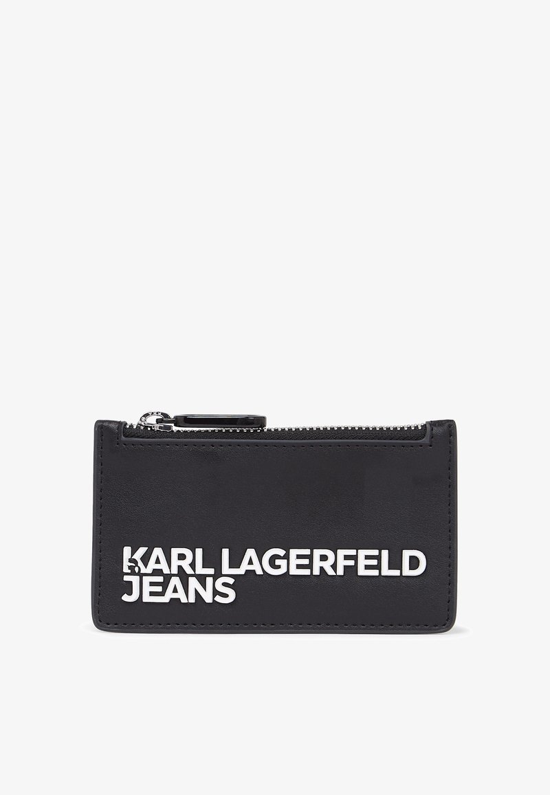 Portafoglio in pelle nera con chiusura a zip, caratterizzato da un evidente brand bianco "KARL LAGERFELD JEANS" sul fronte. Texture liscia, forma rettangolare.