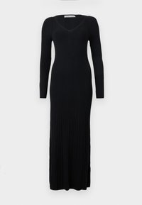 Long-sleeve black ribbed dress with a V-neck and a fitted silhouette, extending to the ankles. Material shows vertical texture.